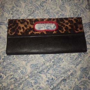 Animal print black and red clutch